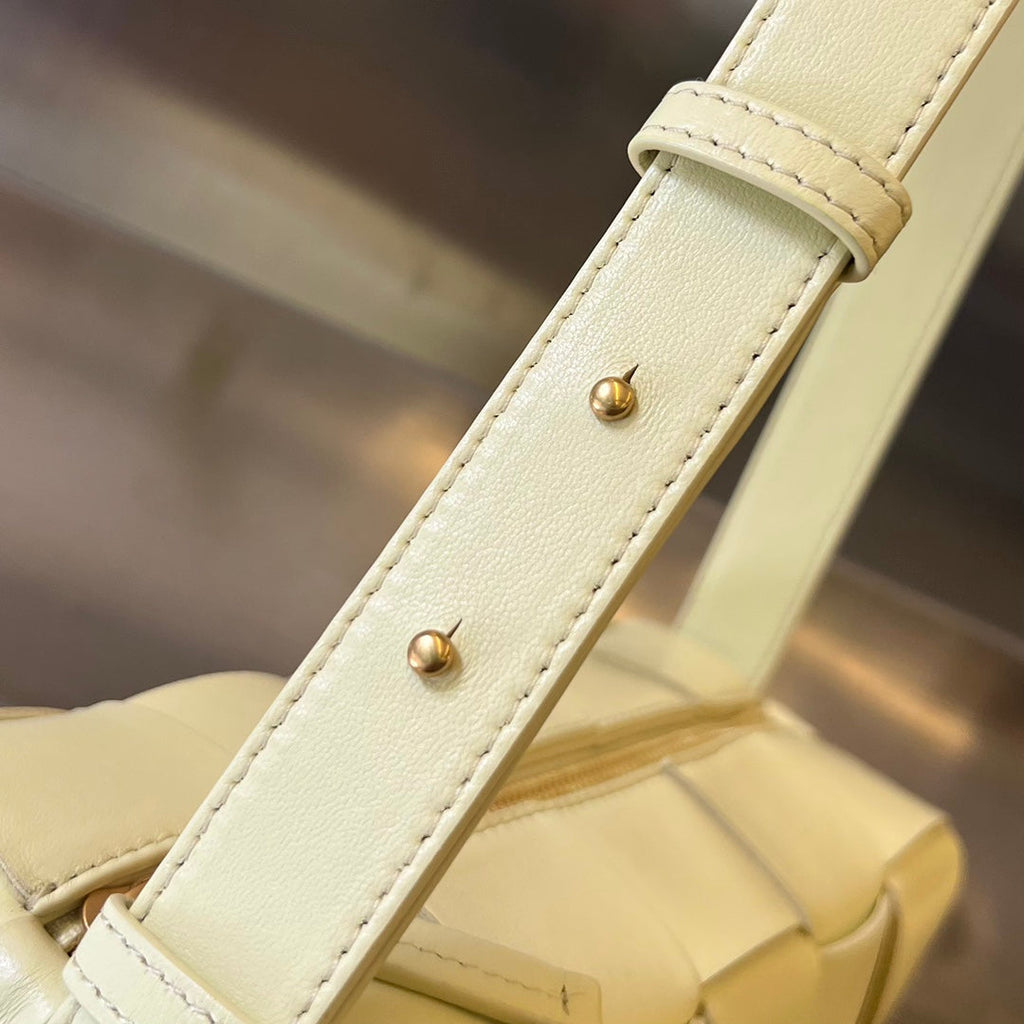 BOTTEGA VENETA BRICK CASSETTE 28 IN PASTEL YELLOW CALFSKIN