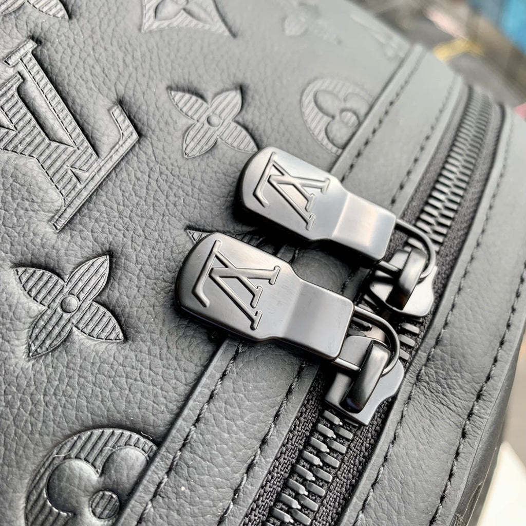 LOUIS VUITTON DISCOVERY PM BACKPACK 38 IN BLACK MONOGRAM LAMBSKIN