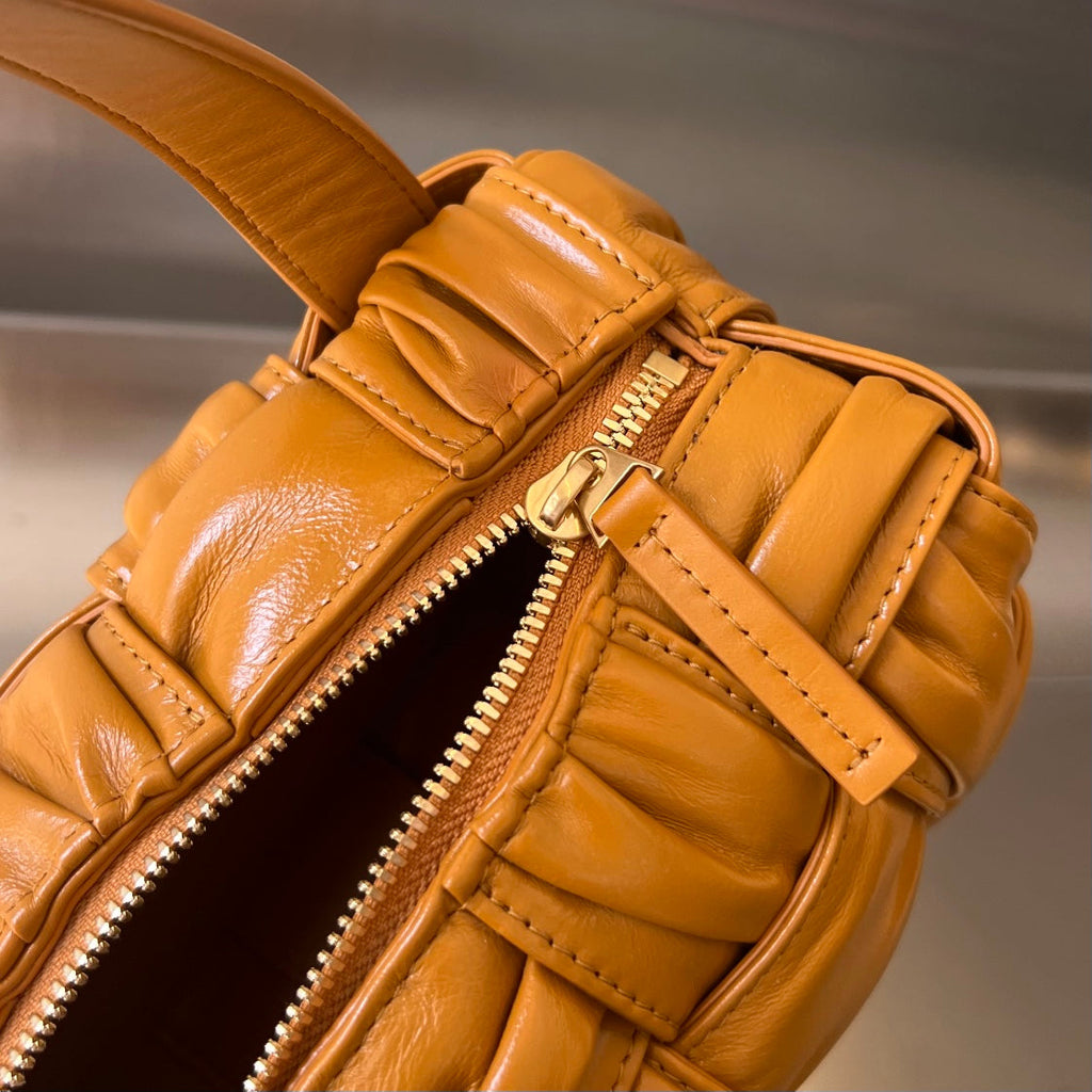BOTTEGA VENETA SMALL BRICK CASSETTE 23 IN SANDSTONE ORANGE SOFT LAMBSKIN