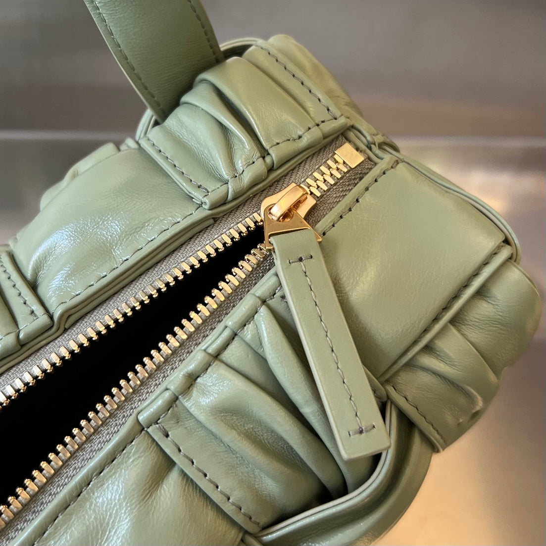 BOTTEGA VENETA SMALL BRICK CASSETTE 23 IN SWAMP GREEN SOFT LAMBSKIN