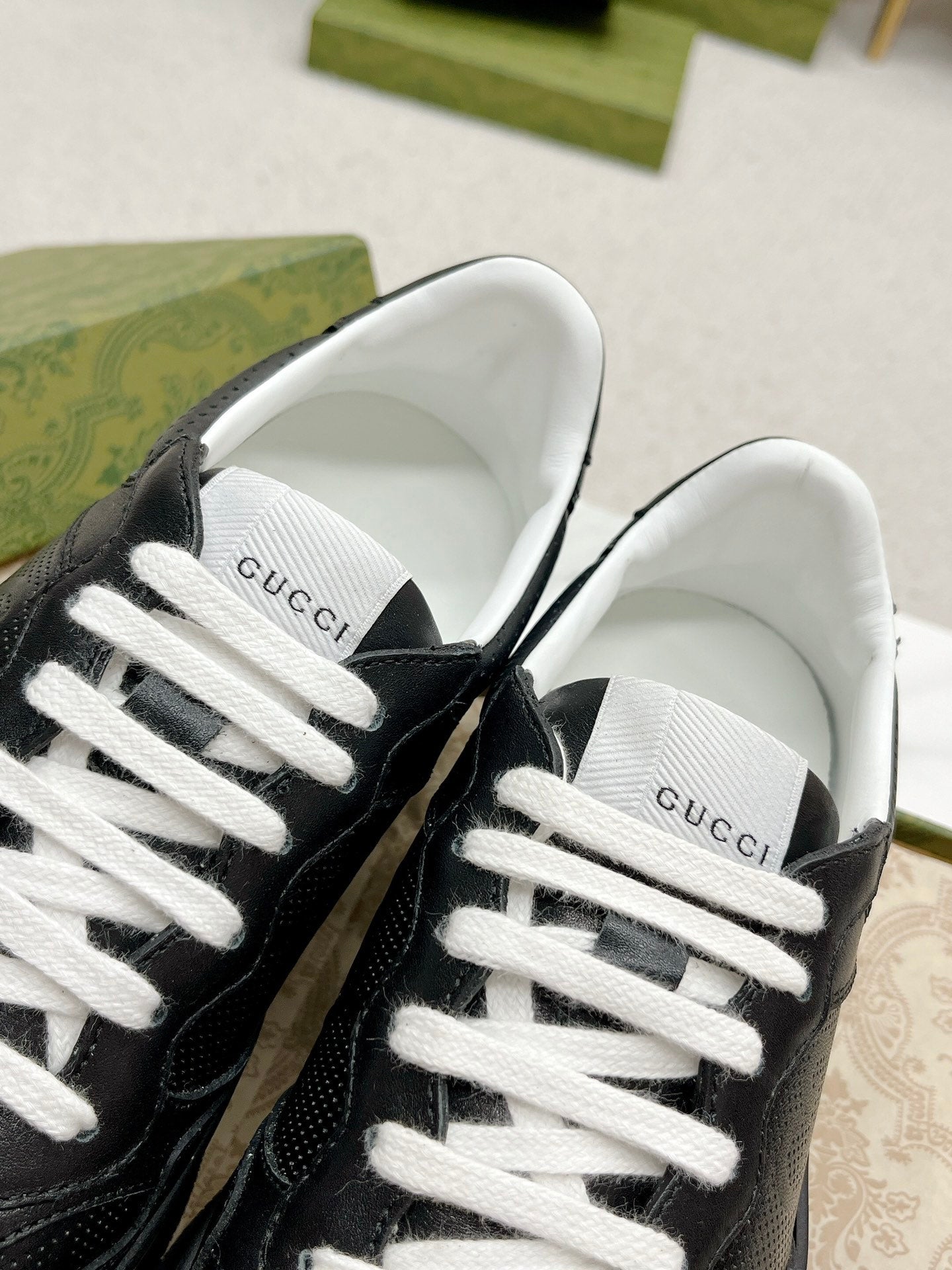 GUCCI EMBOSSED TRAINER BLACK CALFSKIN