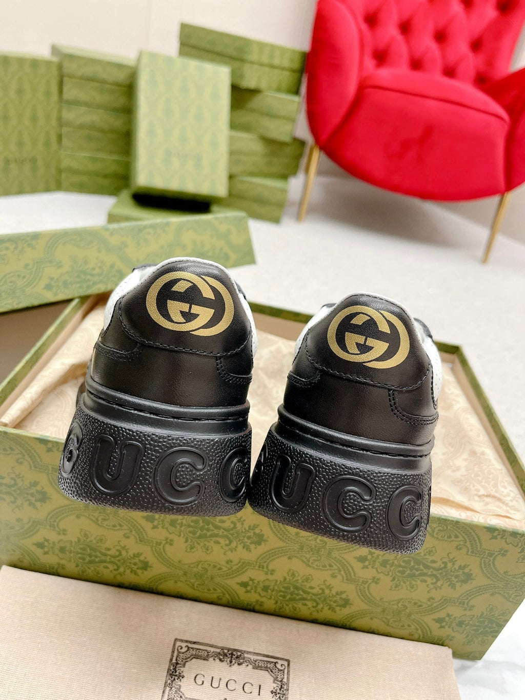 GUCCI EMBOSSED TRAINER BLACK AND WHITE CALFSKIN