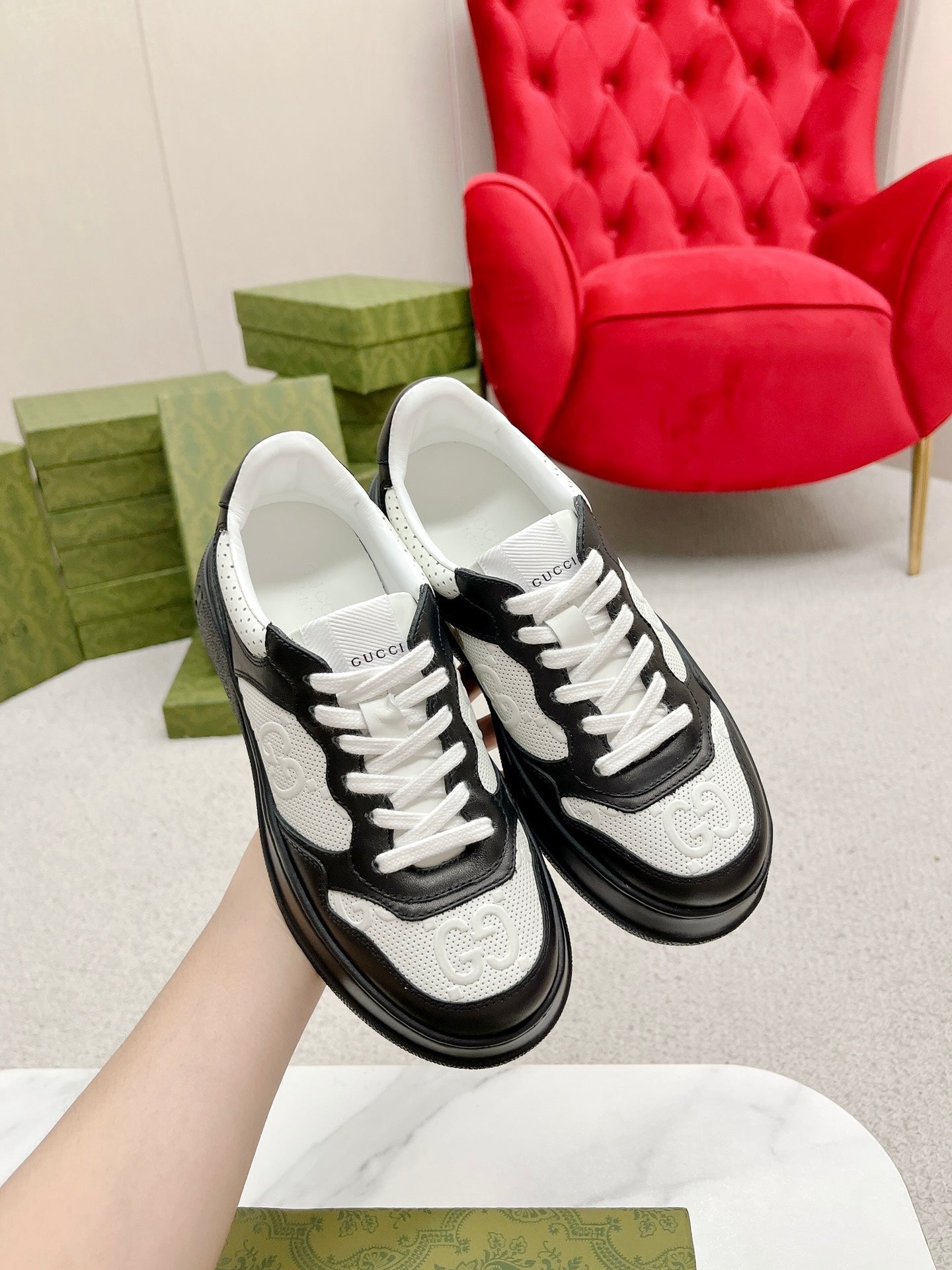 GUCCI EMBOSSED TRAINER BLACK AND WHITE CALFSKIN