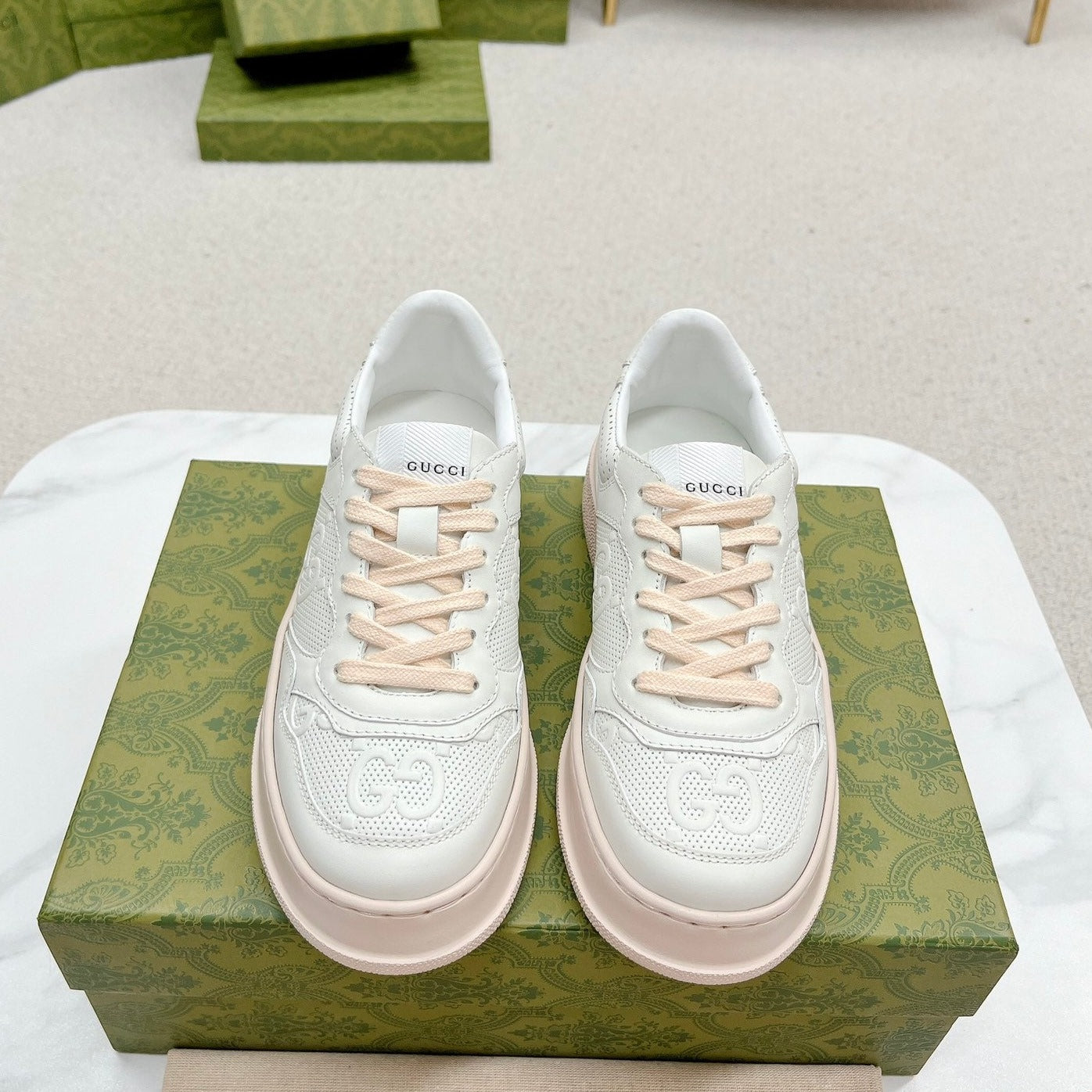 GUCCI EMBOSSED TRAINER WHITE AND PASTEL PINK CALFSKIN