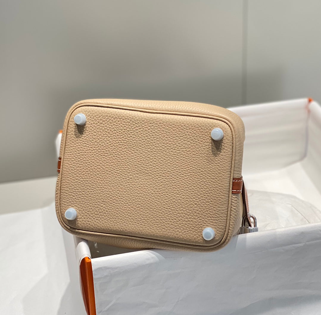 HERMES 25S PICOTIN LOCK 18 IN BURNT ORANGE AND LIGHT BROWN CALFSKIN SILVER HARDWARE