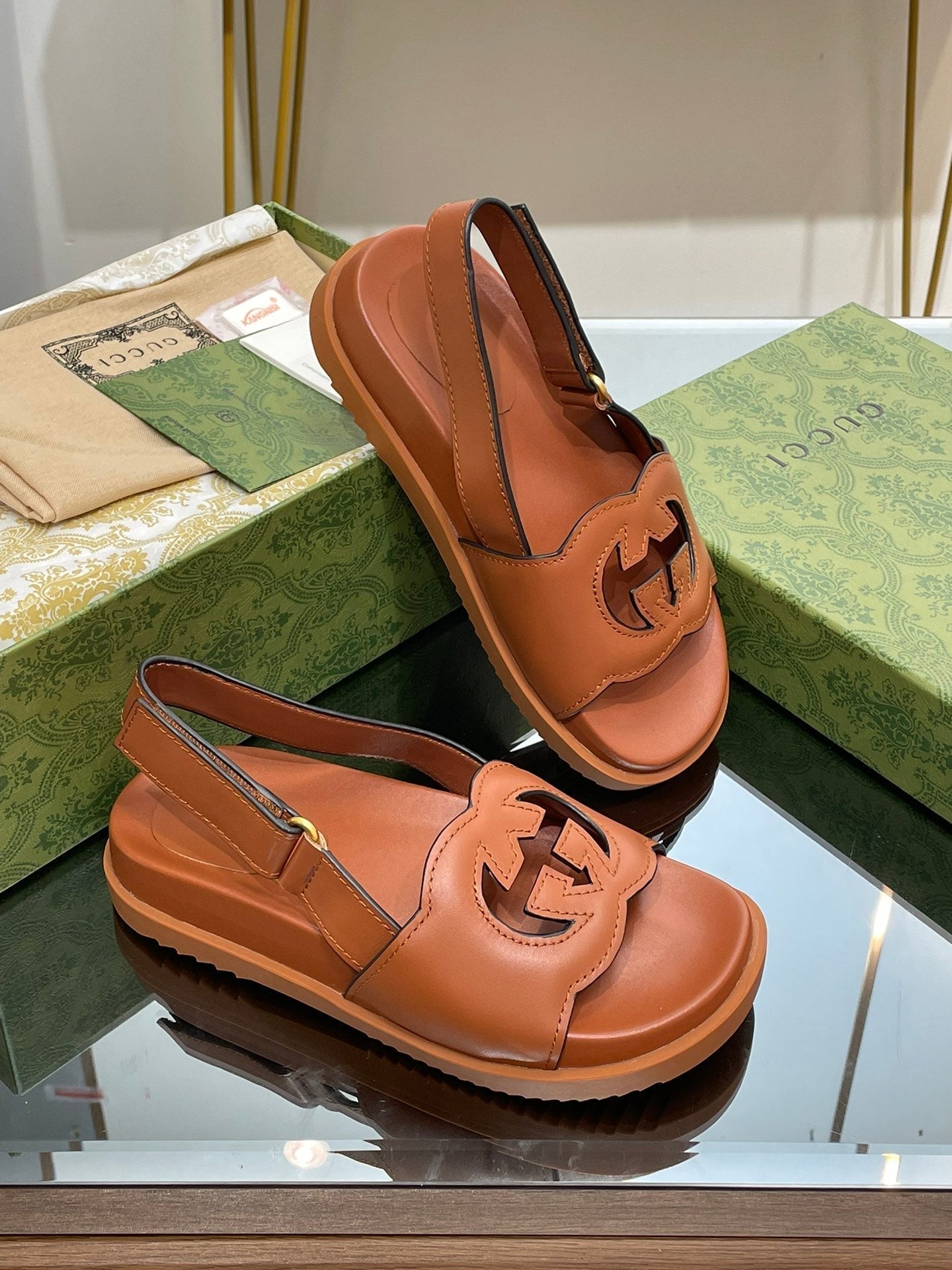 GUCCI INTERLOCKING G CUT OUT SANDAL CARAMEL LAMBSKIN