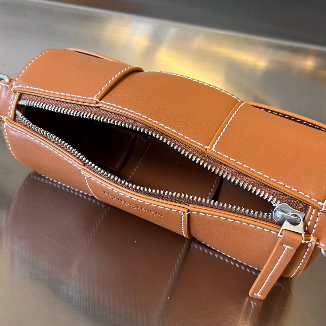 BOTTEGA VENETA SMALL CYLINDER CASSETTE 21 IN RAW SIENNA CALFSKIN