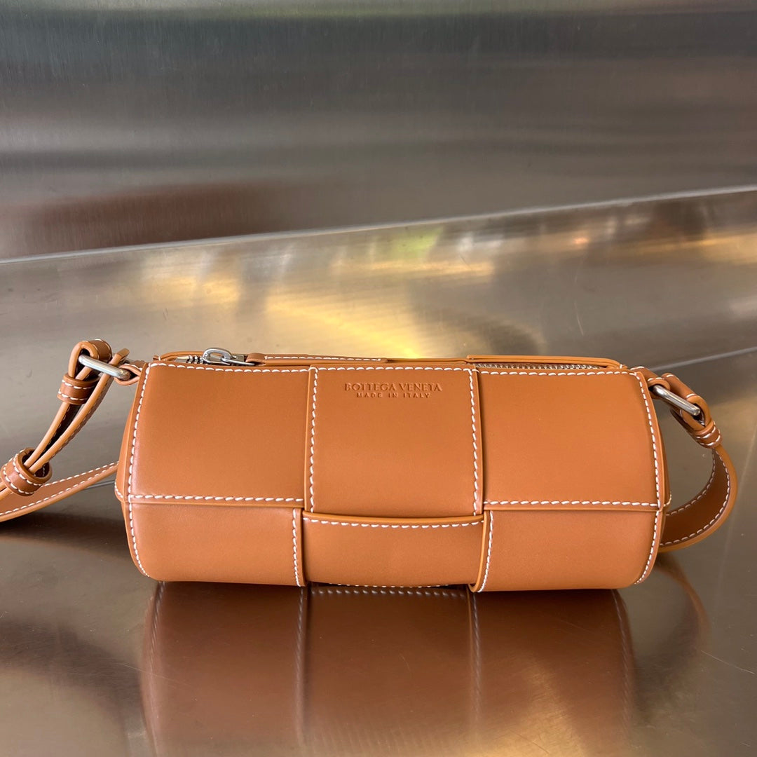 BOTTEGA VENETA SMALL CYLINDER CASSETTE 21 IN RAW SIENNA CALFSKIN