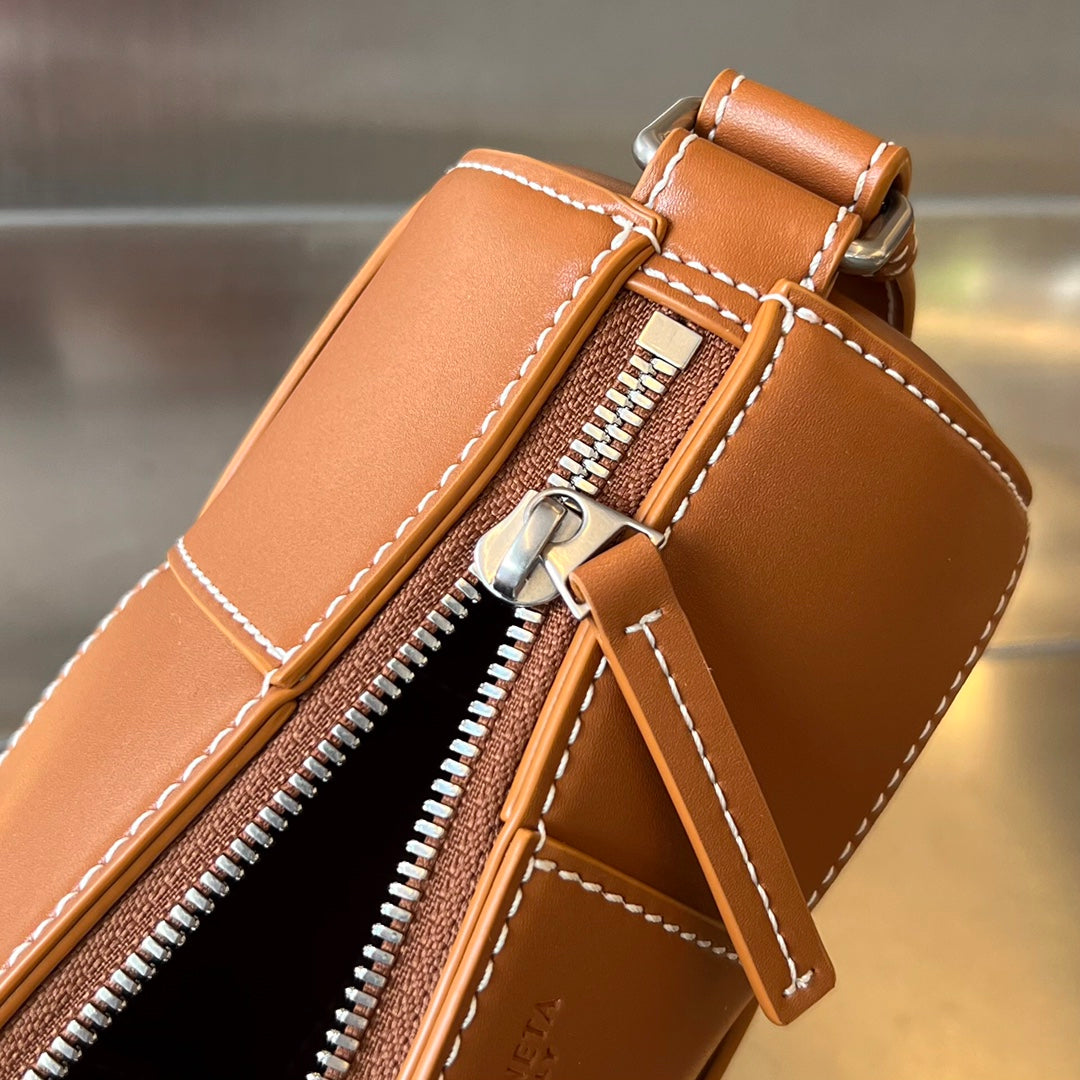 BOTTEGA VENETA SMALL CYLINDER CASSETTE 21 IN RAW SIENNA CALFSKIN