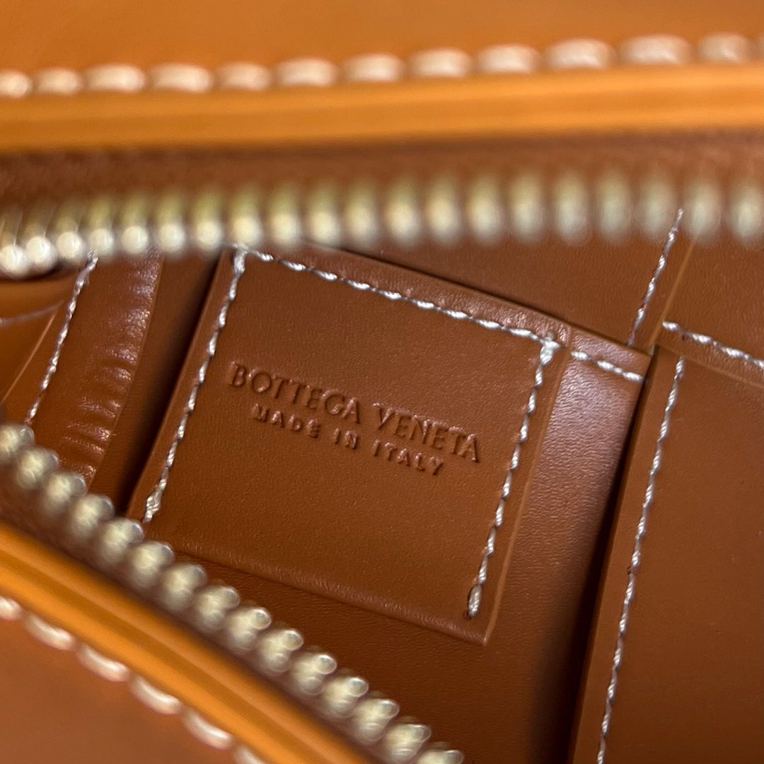 BOTTEGA VENETA SMALL CYLINDER CASSETTE 21 IN RAW SIENNA CALFSKIN