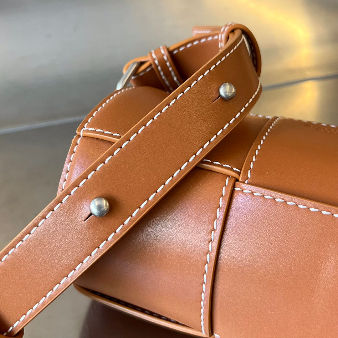 BOTTEGA VENETA SMALL CYLINDER CASSETTE 21 IN RAW SIENNA CALFSKIN