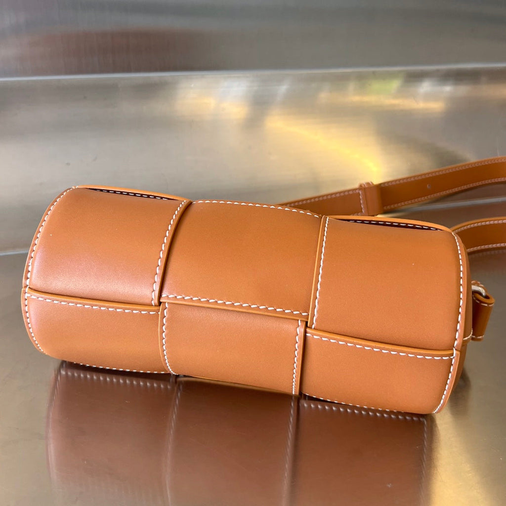 BOTTEGA VENETA SMALL CYLINDER CASSETTE 21 IN RAW SIENNA CALFSKIN