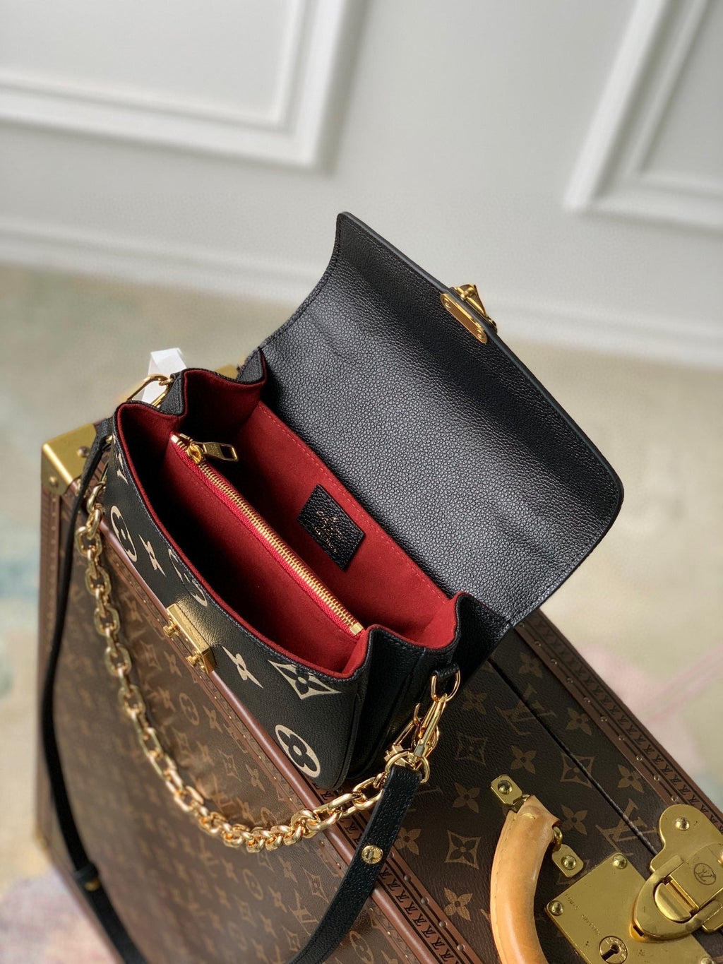 LOUIS VUITTON POCHETTE MÉTIS EAST WEST 21 IN BLACK AND BEIGE MONOGRAM EMPREINTE CALFSKIN EMBOSSED LOGO