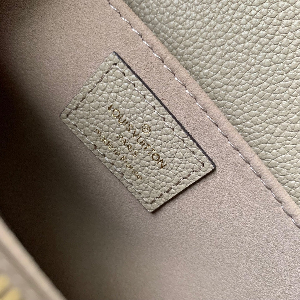 LOUIS VUITTON POCHETTE MÉTIS EAST WEST 21 IN BEIGE MONOGRAM EMPREINTE CALFSKIN EMBOSSED LOGO