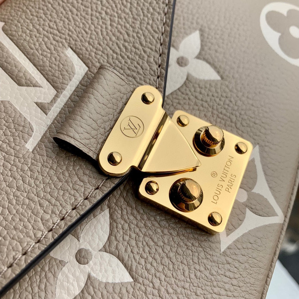 LOUIS VUITTON POCHETTE MÉTIS EAST WEST 21 IN BEIGE MONOGRAM EMPREINTE CALFSKIN EMBOSSED LOGO