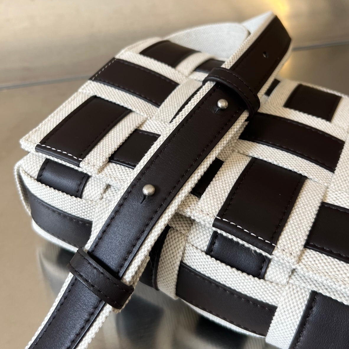 BOTTEGA VENETA MINI CASSETTE 23 IN BLACK WHITE CALFSKIN