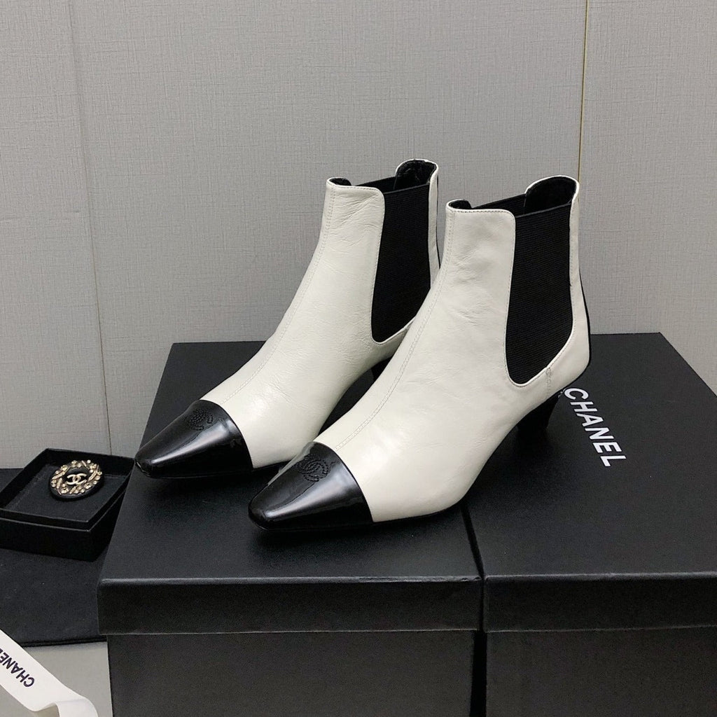 CHANEL SHORT BOOTS IN WHITE MIX BLACK SHEEPSKIN