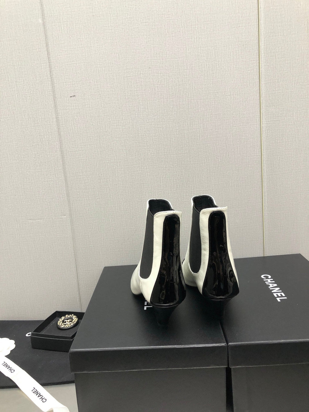 CHANEL SHORT BOOTS IN WHITE MIX BLACK SHEEPSKIN