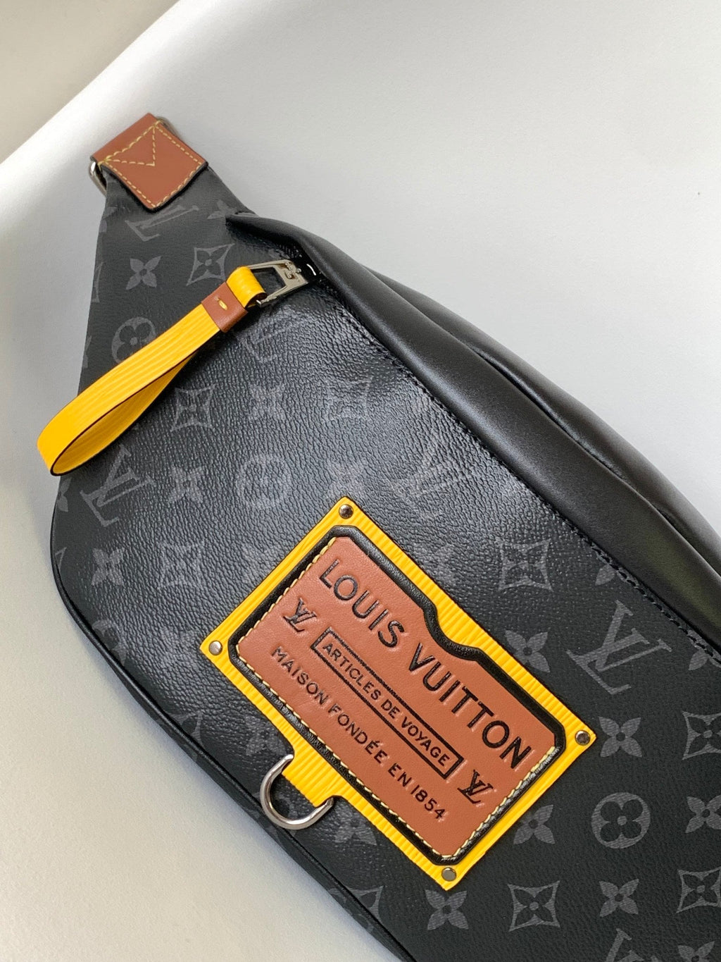 LOUIS VUITTON LV 25S BUMBAG 37 IN BLACK AND YELLOW COATED MONOGRAM CALFSKIN