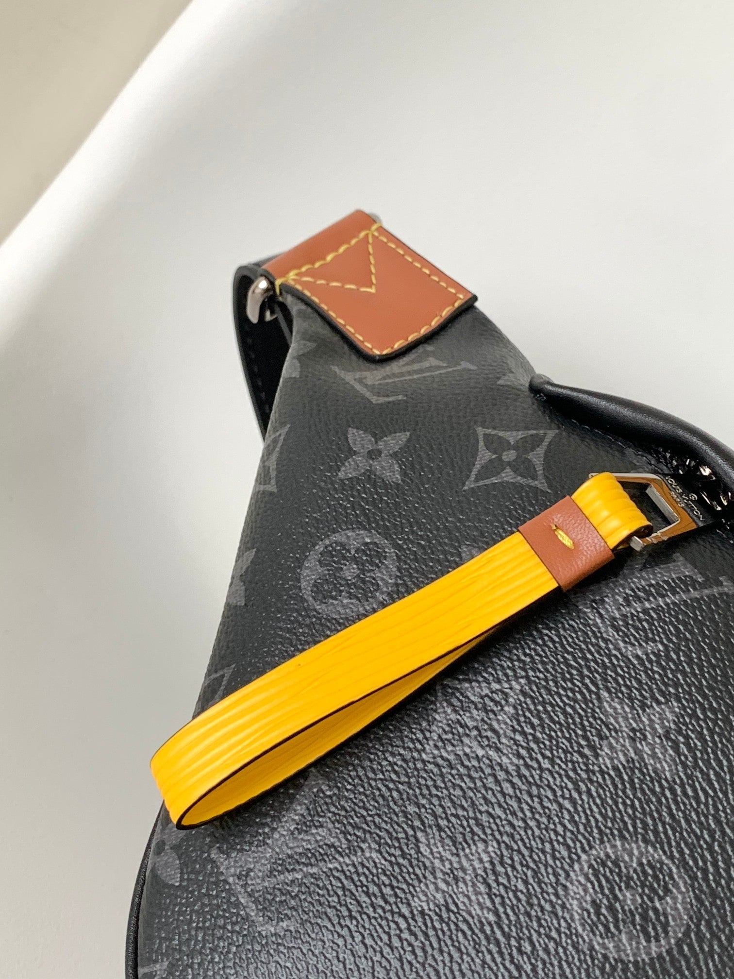 LOUIS VUITTON LV 25S BUMBAG 37 IN BLACK AND YELLOW COATED MONOGRAM CALFSKIN