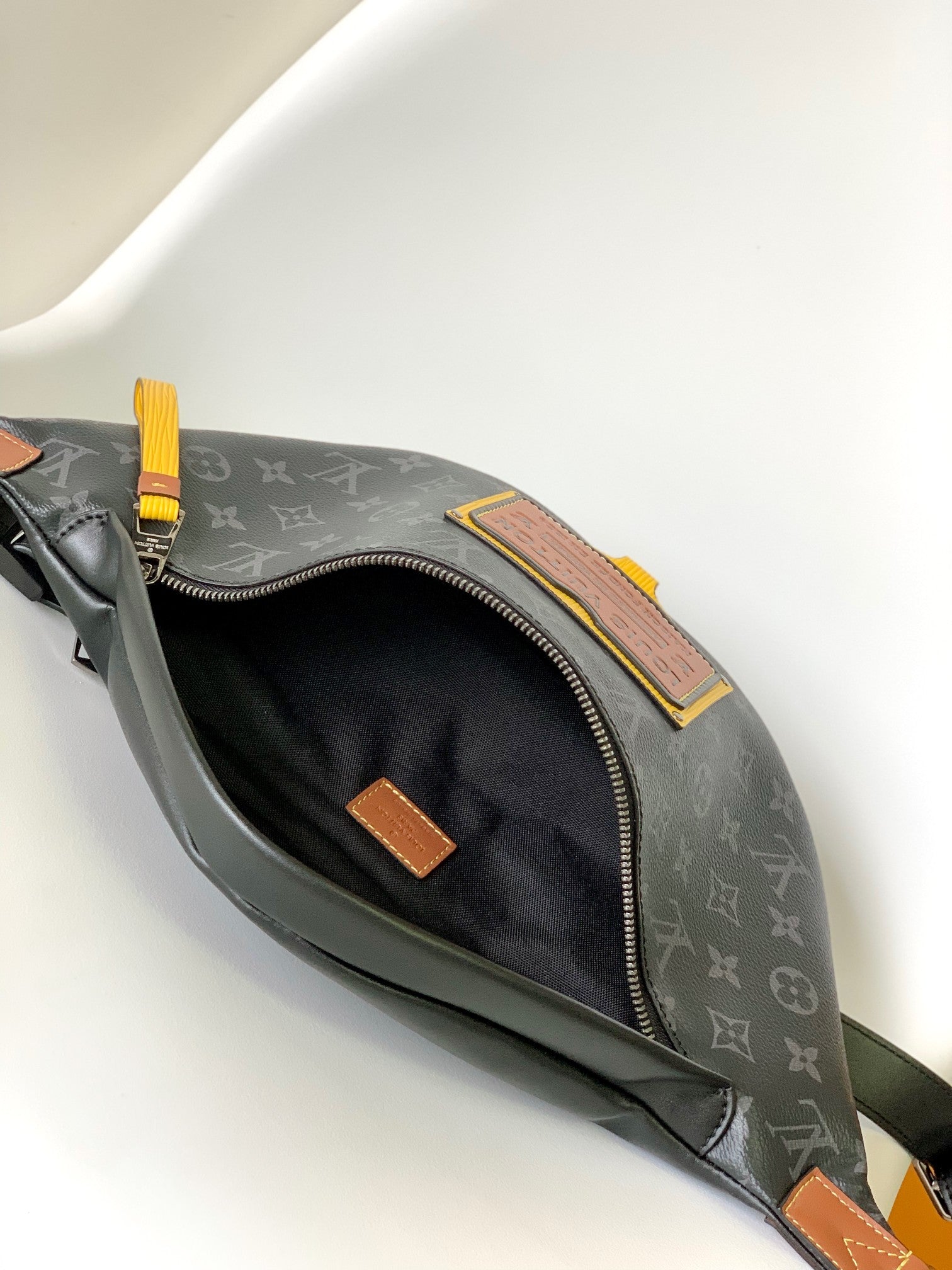 LOUIS VUITTON LV 25S BUMBAG 37 IN BLACK AND YELLOW COATED MONOGRAM CALFSKIN