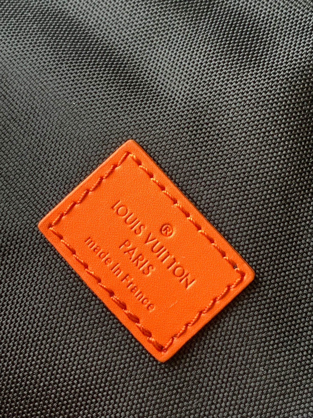 LOUIS VUITTON LV 25S BUMBAG 37 IN BLACK AND ORANGE COATED MONOGRAM CALFSKIN