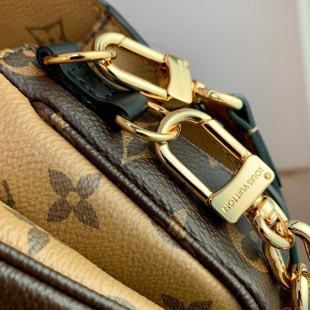 LOUIS VUITTON POCHETTE MÉTIS EAST WEST 21.5 IN BROWN MONOGRAM COATED CANVAS AND CALFSKIN