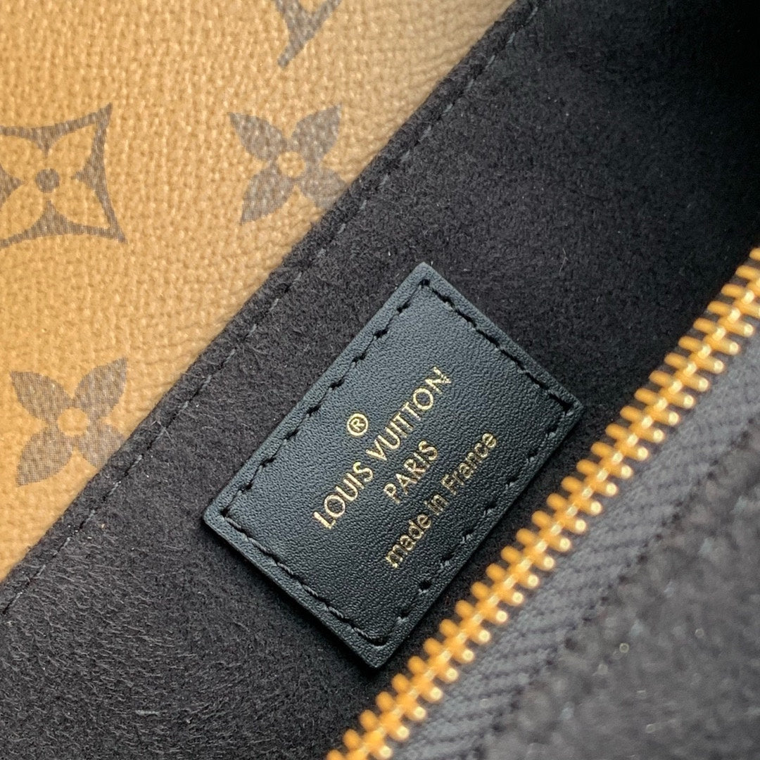 LOUIS VUITTON POCHETTE MÉTIS EAST WEST 21.5 IN BROWN MONOGRAM COATED CANVAS AND CALFSKIN