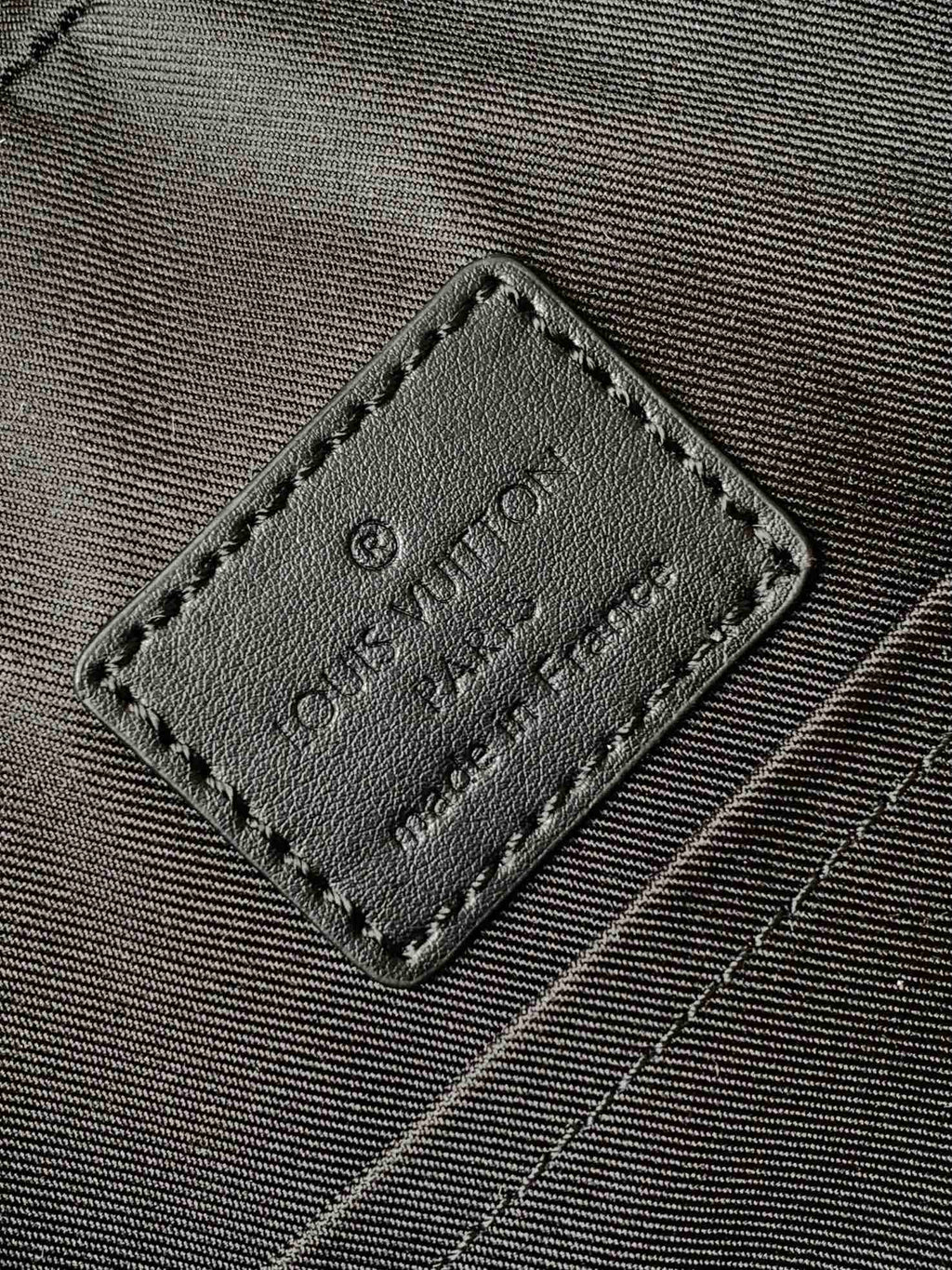 LOUIS VUITTON DISCOVERY BACKPACK 41 IN BLACK MONOGRAM MACASSAR CANVAS AND CALFSKIN