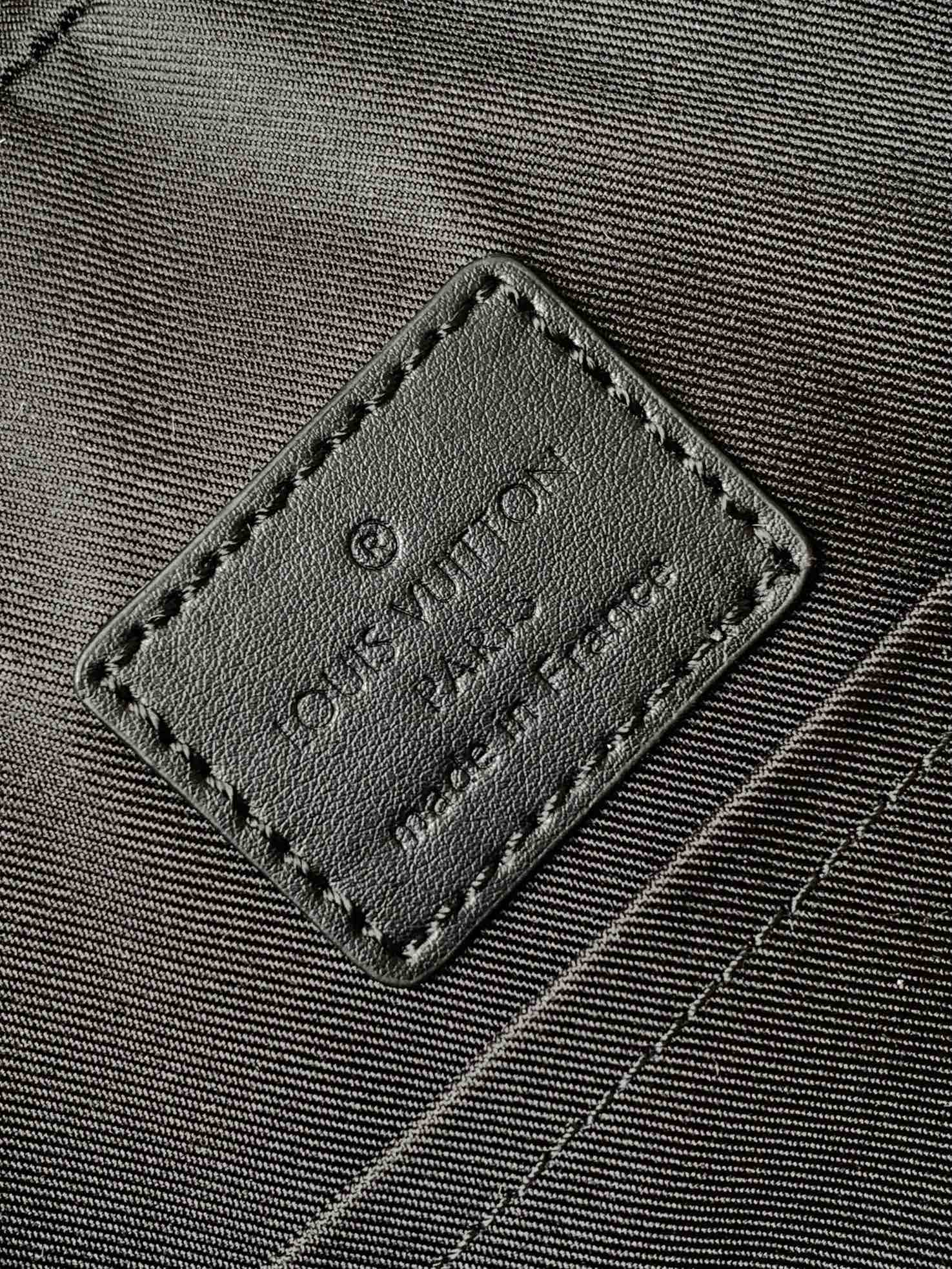 LOUIS VUITTON DISCOVERY BACKPACK 41 IN BLACK MONOGRAM MACASSAR CANVAS AND CALFSKIN