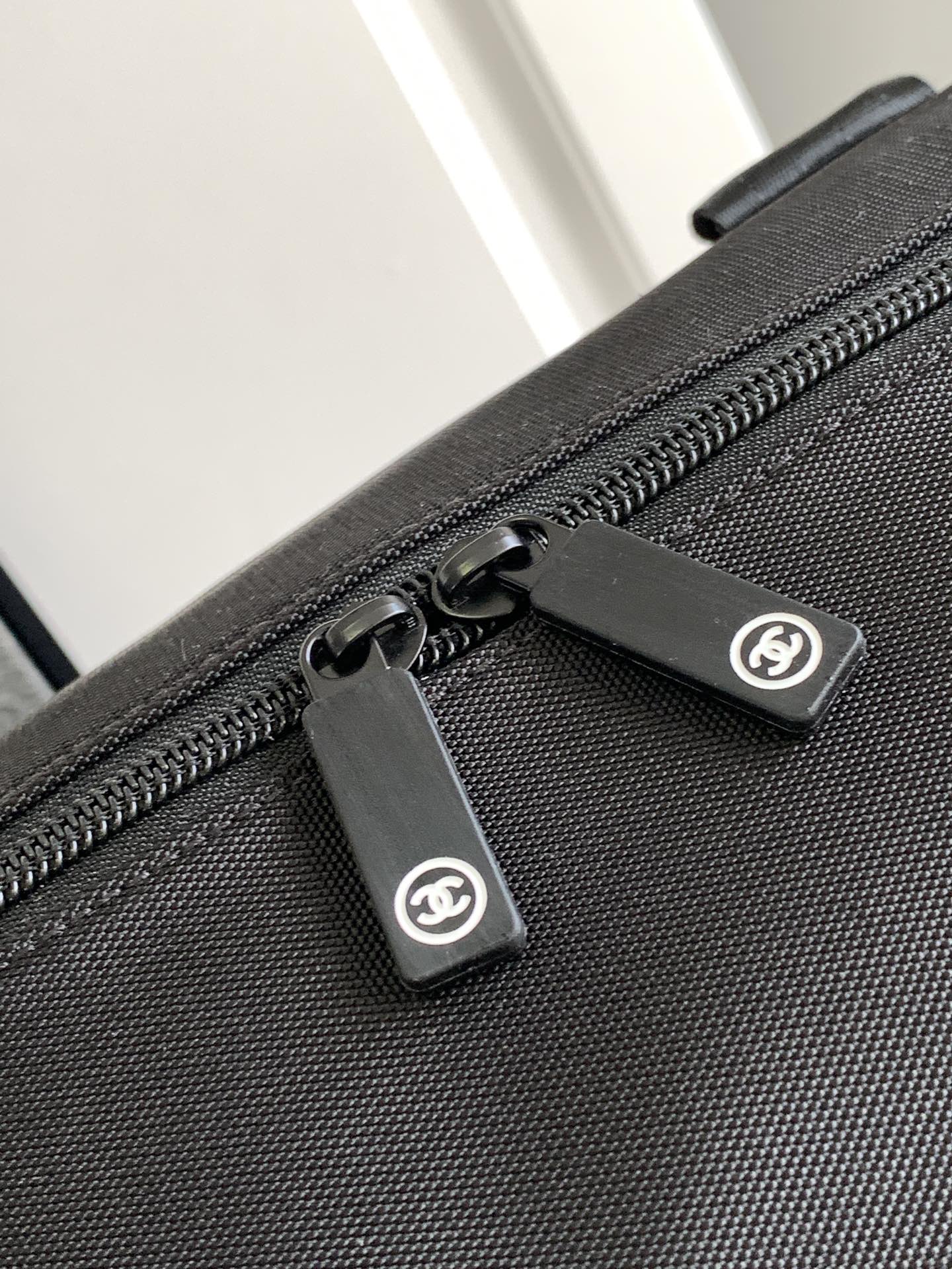 CHANEL TRAVEL BAG 45 IN BLACK CANVAS WITH WHITE LOGO