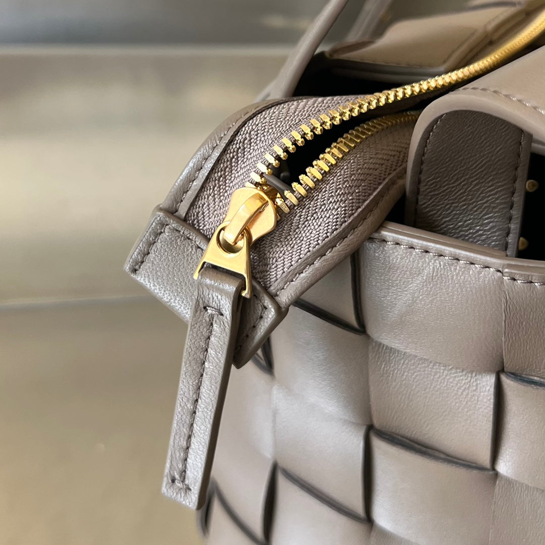 BOTTEGA VENETA SMALL 22 CASSETTE IN CAMEL BROWN LAMBSKIN