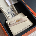 HERMES KELLY DESORDRE 20 IN WHITE EPSOM LEATHER WITH GOLD HARDWARE