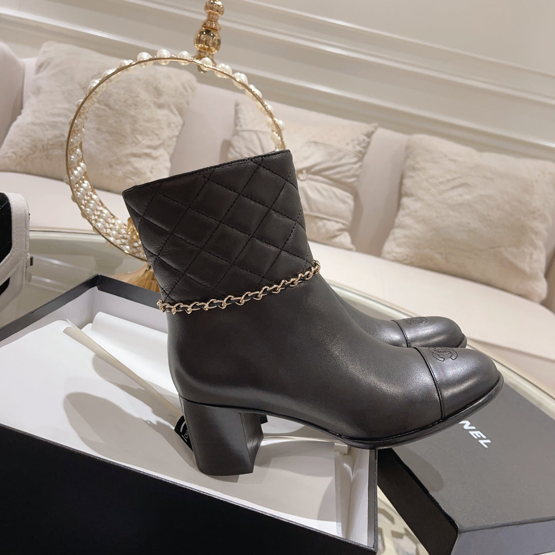 CHANEL MID-HEEL ANKLE BOOTS IN BLACK CALFSKIN