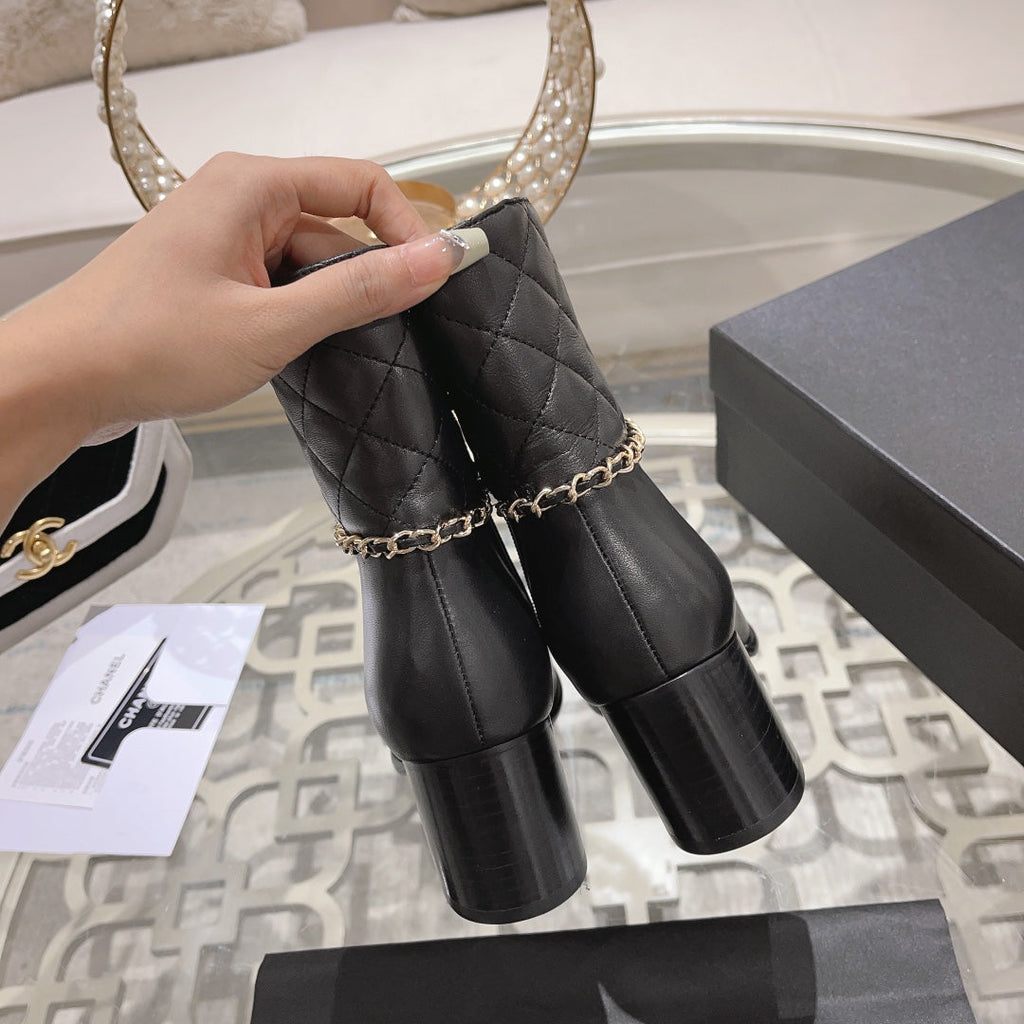 CHANEL MID-HEEL ANKLE BOOTS IN BLACK CALFSKIN