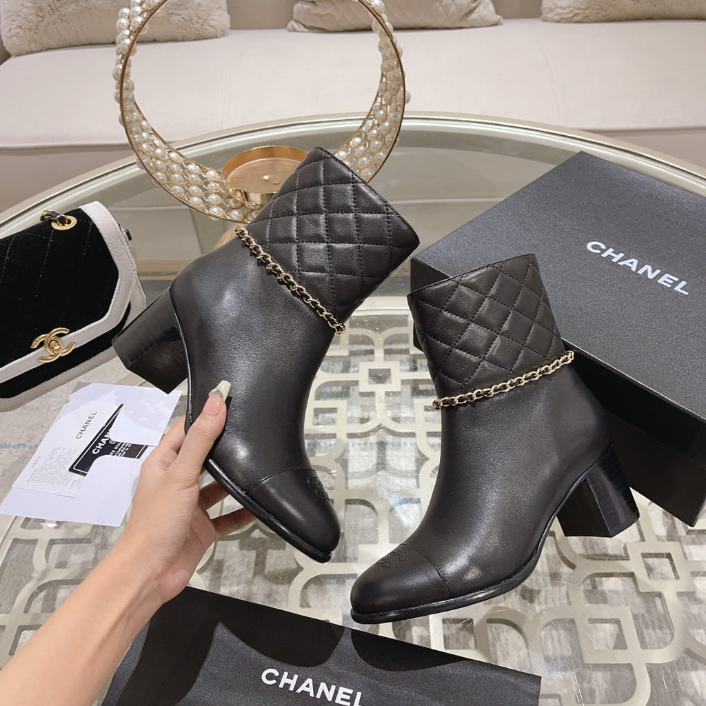 CHANEL MID-HEEL ANKLE BOOTS IN BLACK CALFSKIN