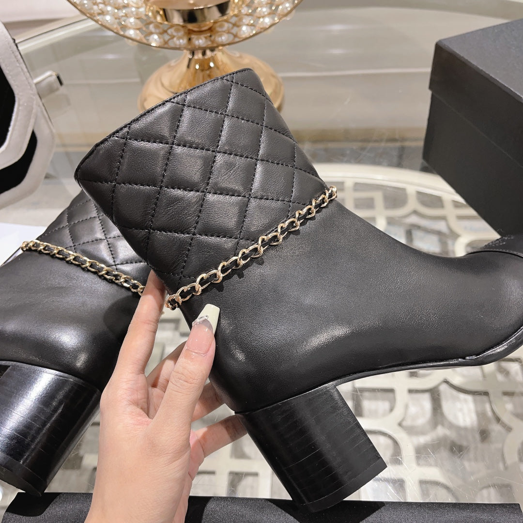 CHANEL MID-HEEL ANKLE BOOTS IN BLACK CALFSKIN