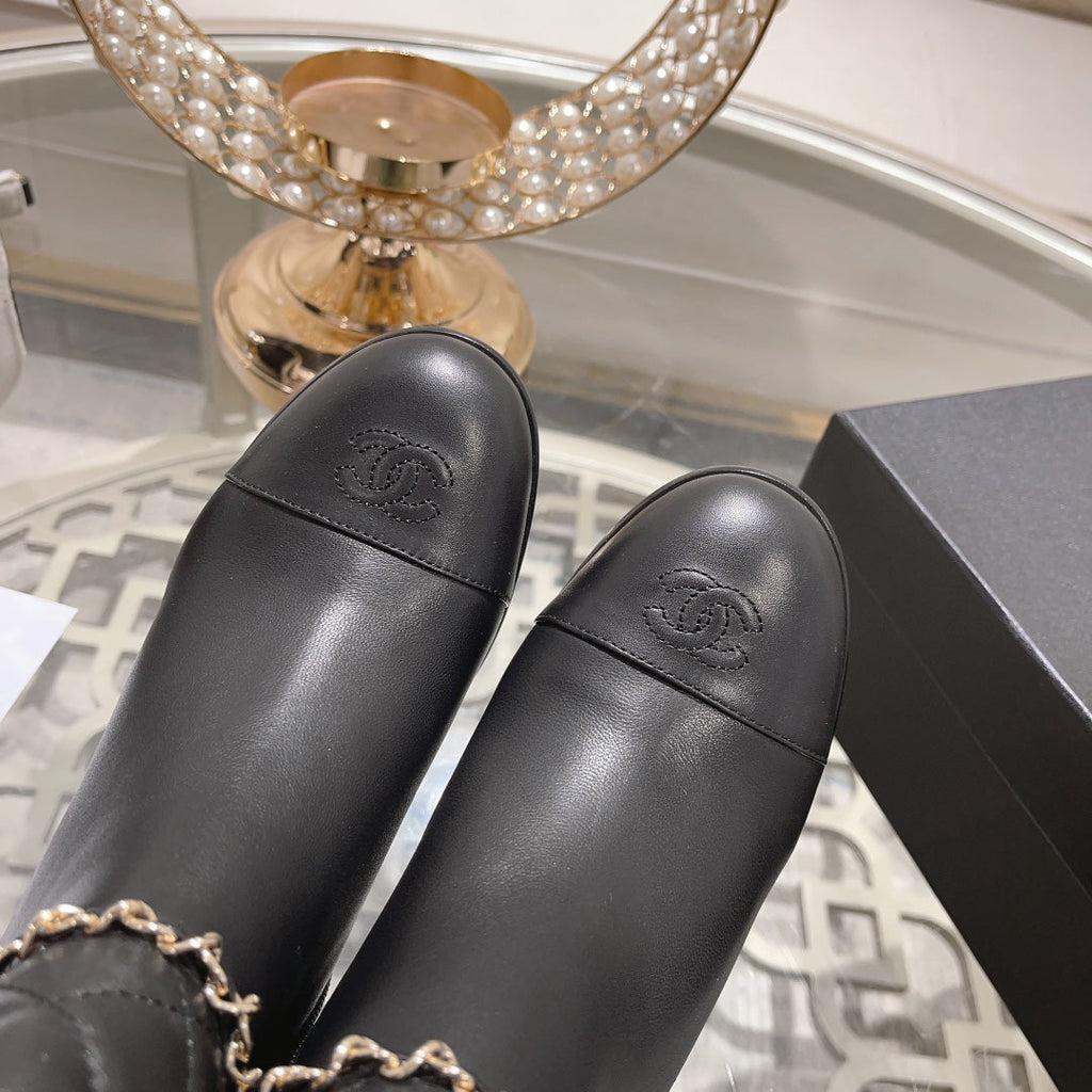 CHANEL MID-HEEL ANKLE BOOTS IN BLACK CALFSKIN
