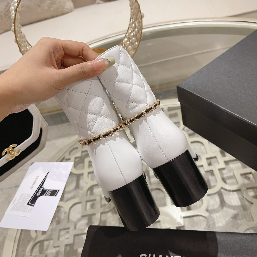 CHANEL MID-HEEL ANKLE BOOTS IN WHITE CALFSKIN