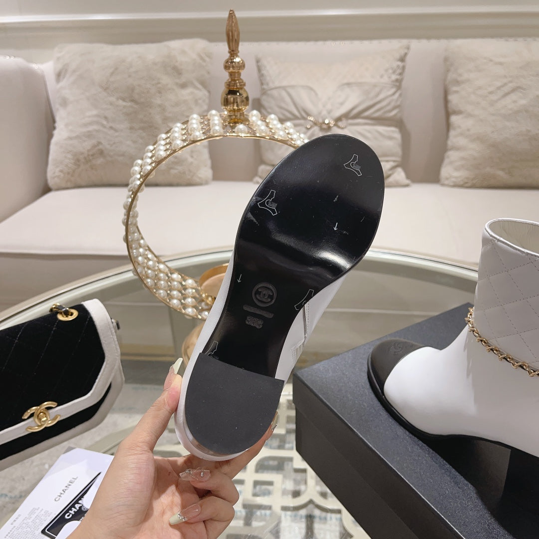 CHANEL MID-HEEL ANKLE BOOTS IN WHITE CALFSKIN