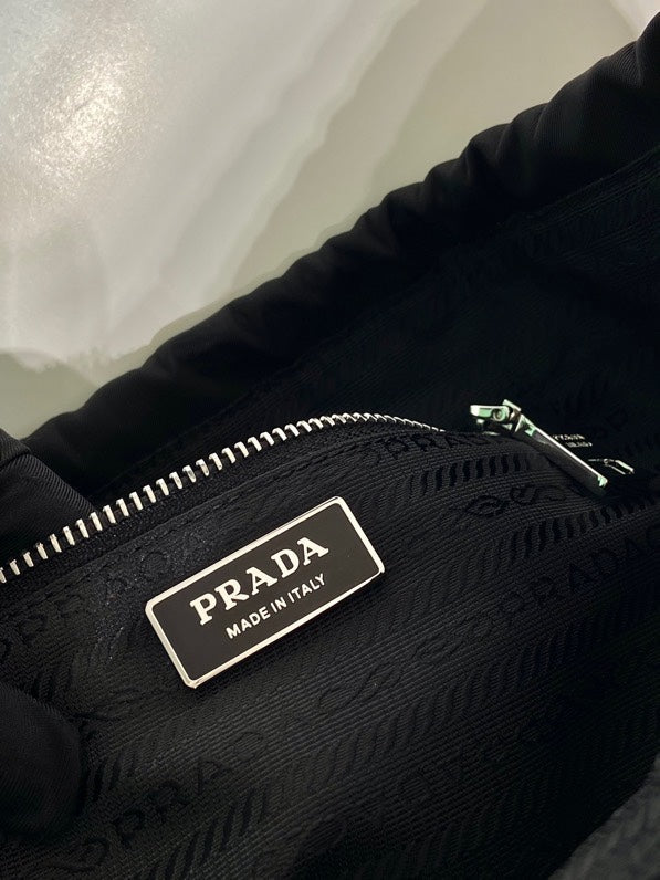 PRADA SMALL DRAWSTRING BAG 23 IN BLACK RE-NYLON
