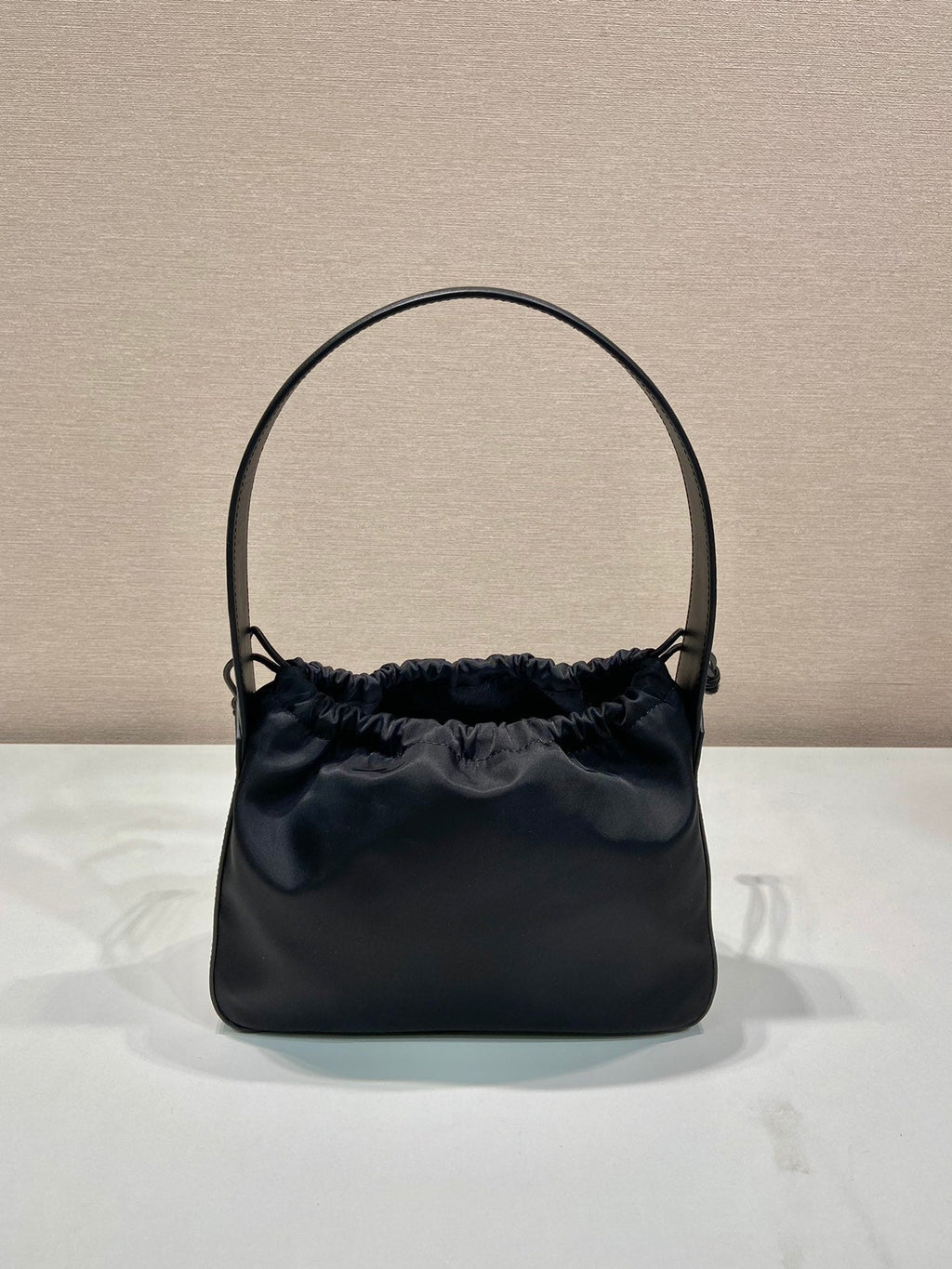 PRADA SMALL DRAWSTRING BAG 23 IN BLACK RE-NYLON