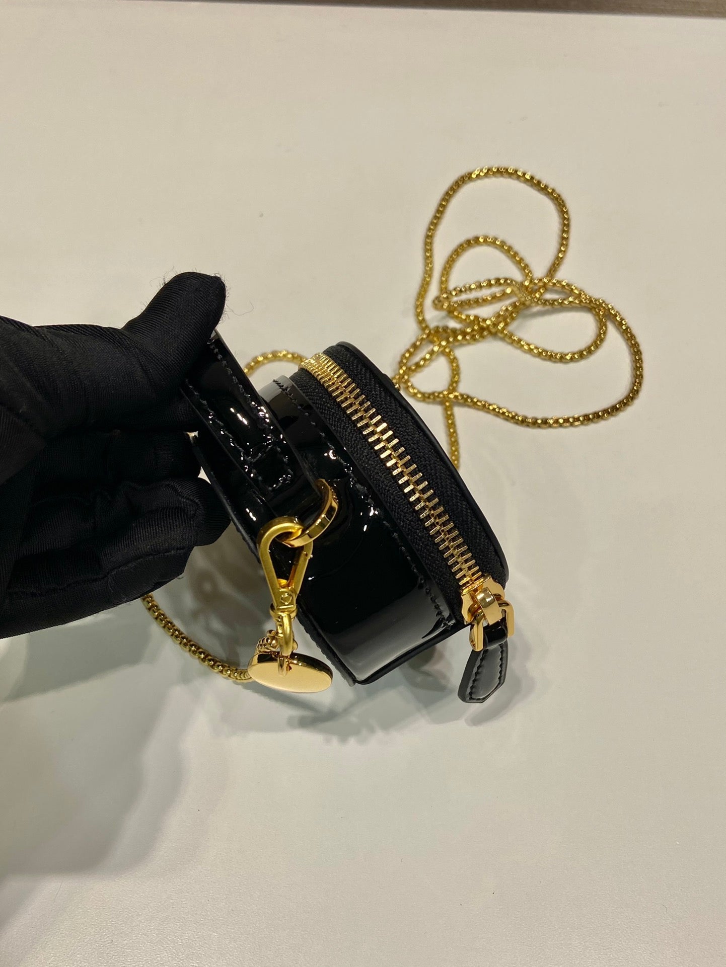 PRADA MINI ROUND BAG 8 IN BLACK GLOSSY CALFSKIN GOLD HARDWARE
