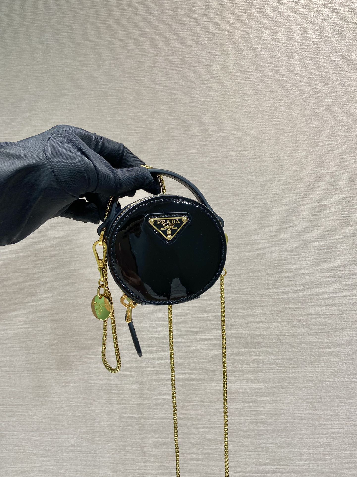 PRADA MINI ROUND BAG 8 IN BLACK GLOSSY CALFSKIN GOLD HARDWARE