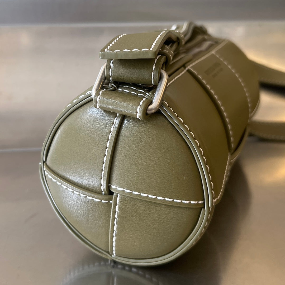 BOTTEGA VENETA SMALL CYLINDER CASSETTE 21 IN TOBACCO BROWN CALFSKIN