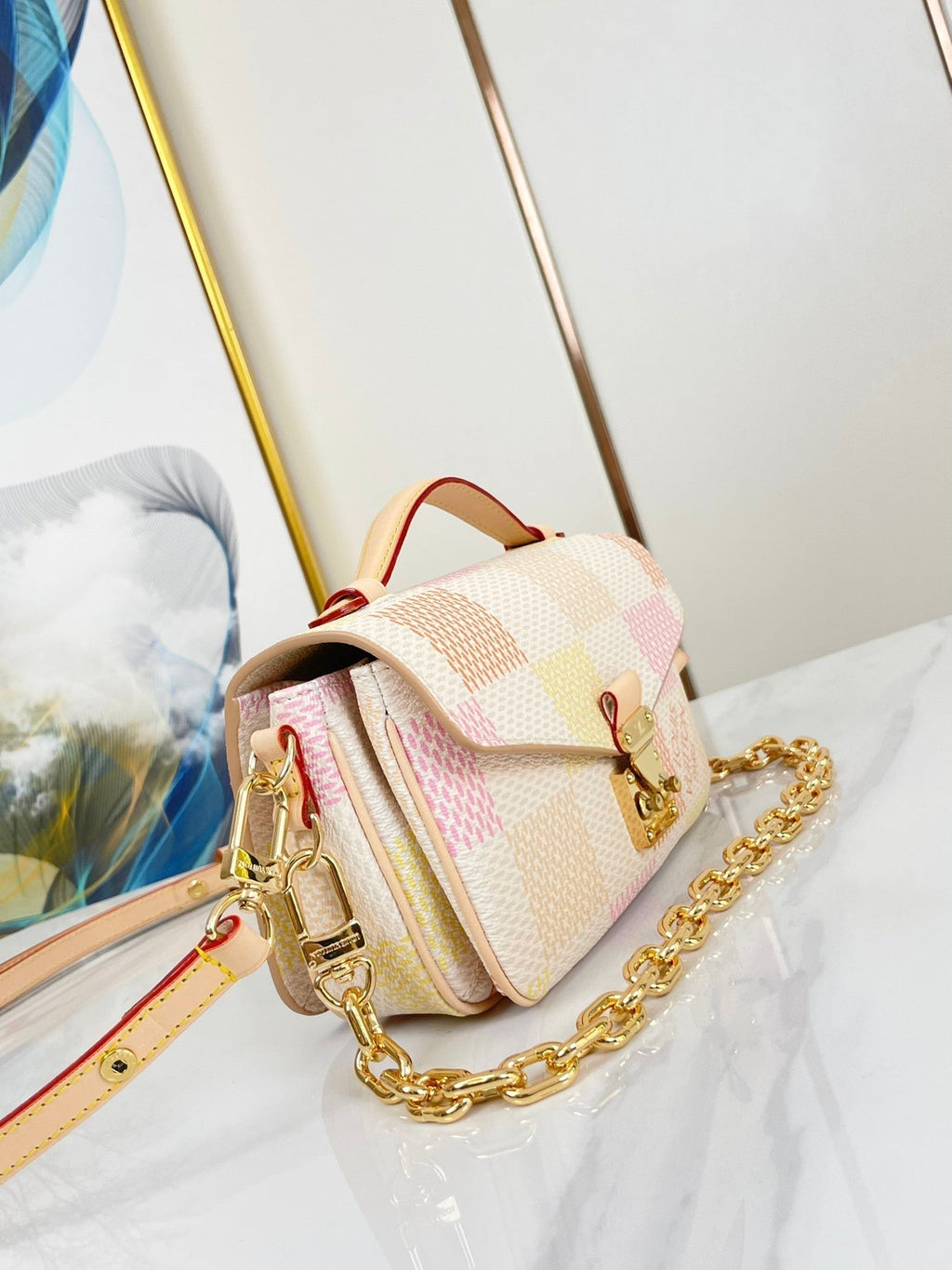 LOUIS VUITTON POCHETTE MÉTIS EAST WEST 21 IN PEACH DAMIER GIANT CANVAS GOLD HARDWARE