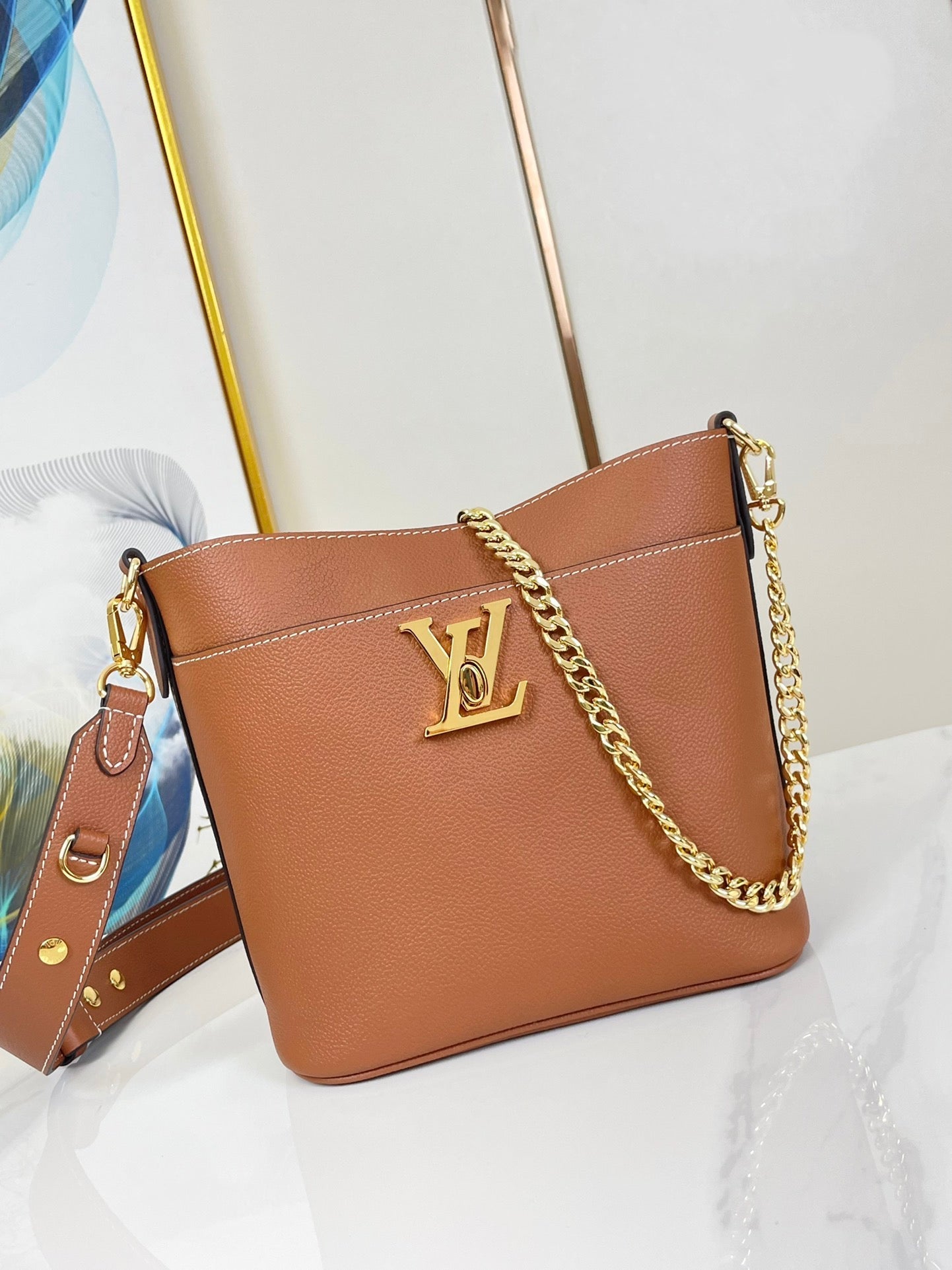 LOUIS VUITTON LOCK AND WALK 20 IN COGNAC GRAINED CALFSKIN GOLD HARDWARE