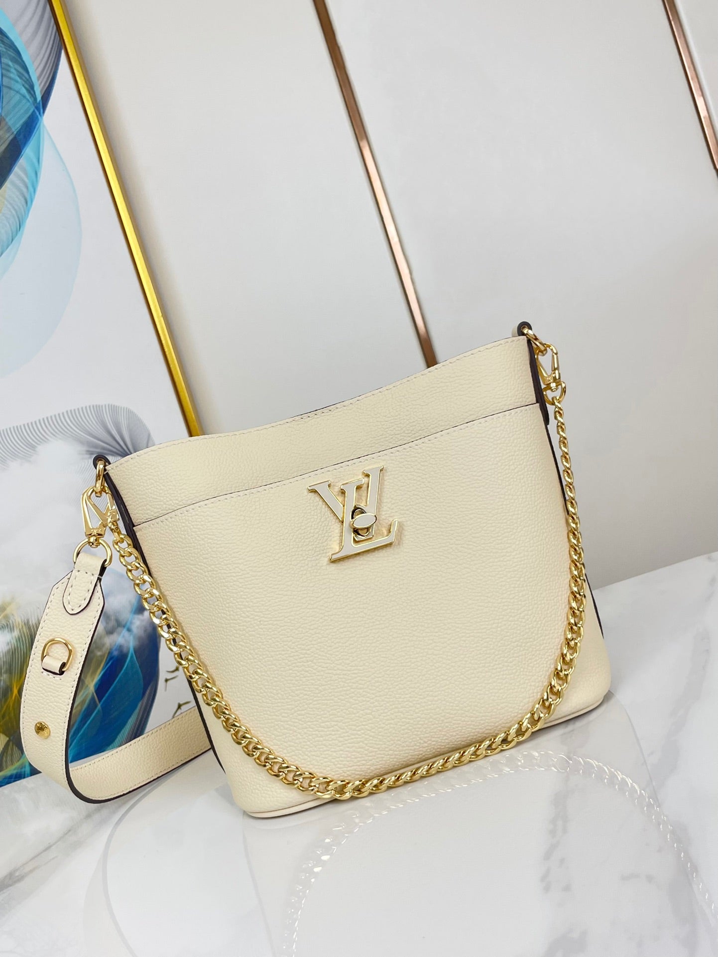 LOUIS VUITTON LOCK AND WALK 20 IN CREAM GRAINED CALFSKIN GOLD HARDWARE