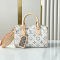 LOUIS VUITTON SPEEDY BANDOULIÈRE 20 IN WHITE MONOGRAM JACQUARD FABRIC AND BEIGE CALFSKIN TRIM