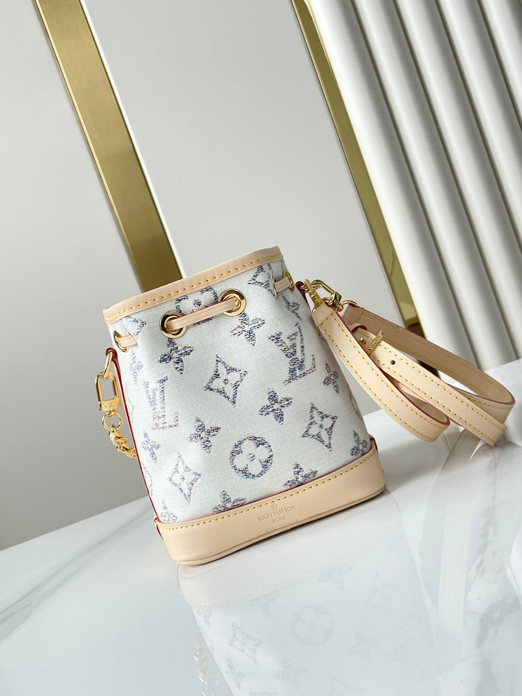 LOUIS VUITTON NANO NOÉ 16 IN WHITE MONOGRAM JACQUARD FABRIC AND BEIGE CALFSKIN TRIM